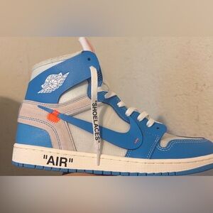 Nike Blue and White High-Top Sneaker with Orange Accent
